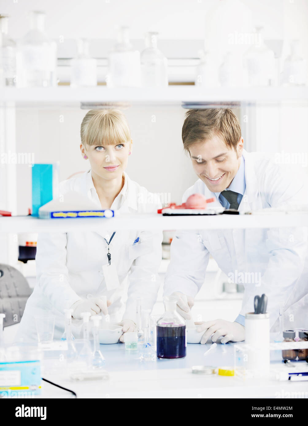 Science Help People science people in bright lab Stock Photo - Alamy