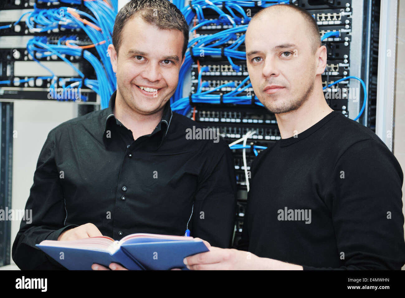 it engineer in network server room Stock Photo