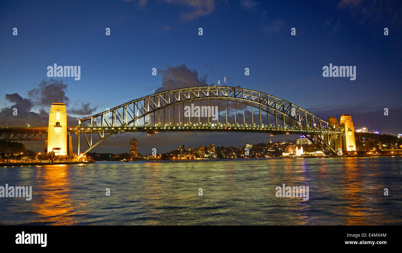 The iconic Sydney Harbour Bridge in Australia at night. Stock Photo