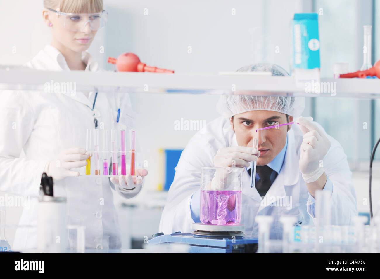 Science Help People science people in bright lab Stock Photo - Alamy