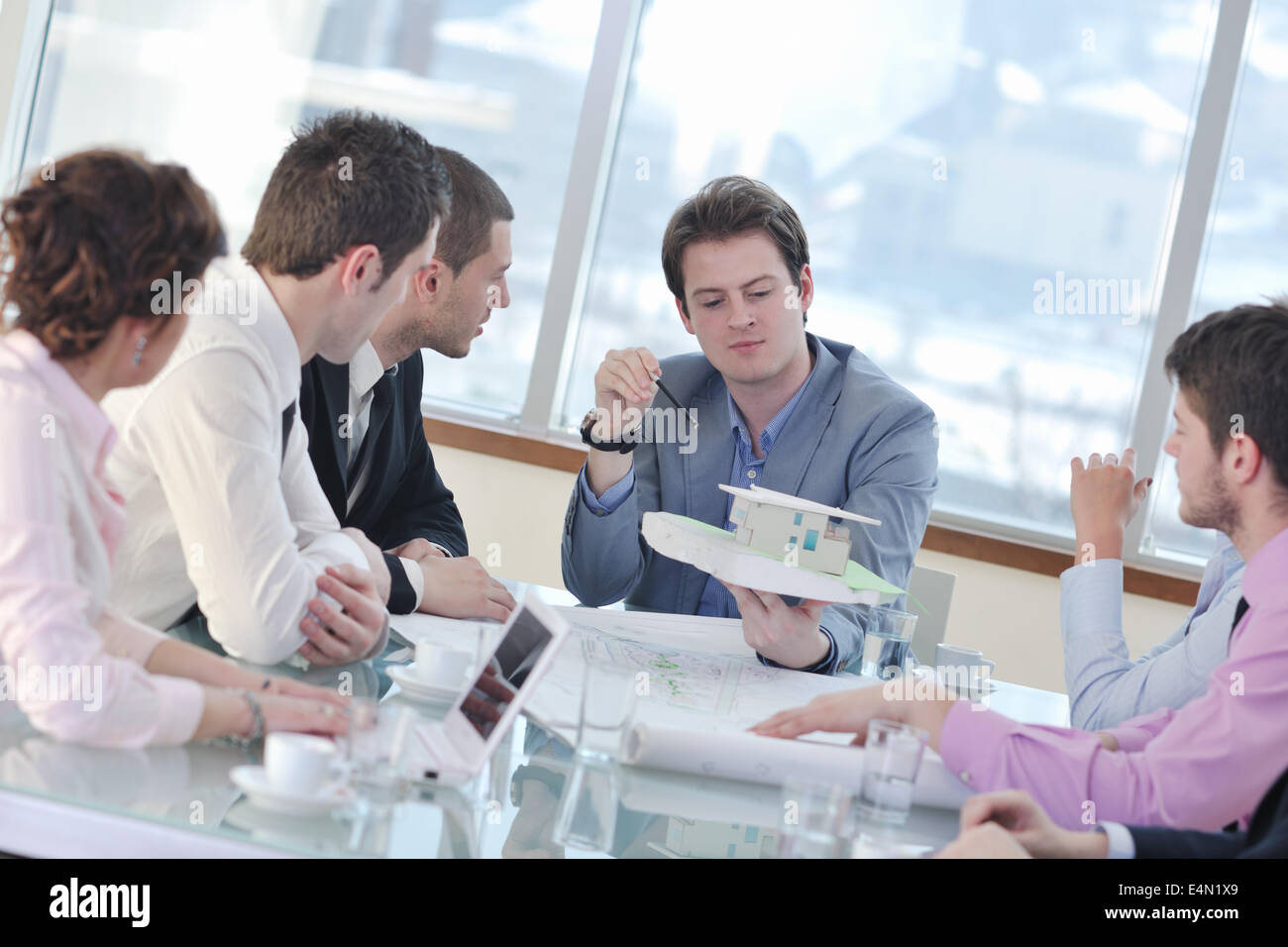 Real people team meeting house hi-res stock photography and images - Alamy