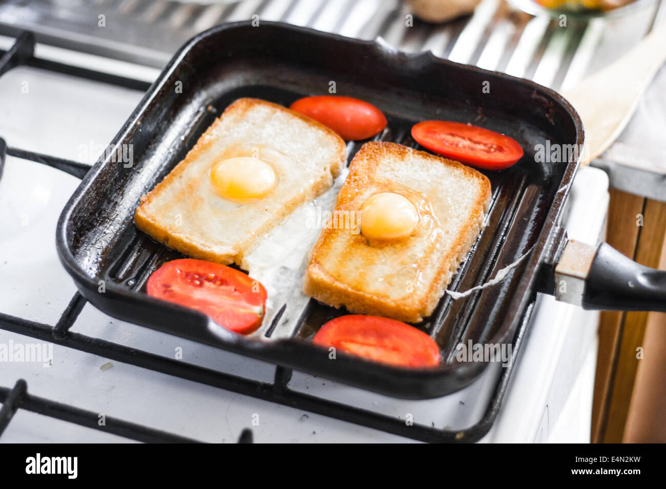 Fried egg in a frying pan Stock Photo Alamy