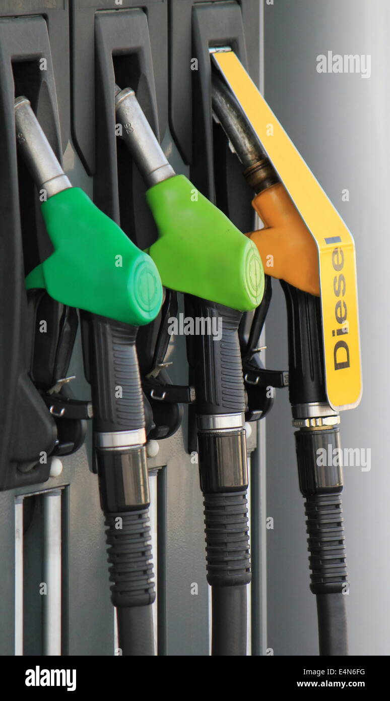 Nozzles of gas and diesel station Stock Photo Alamy