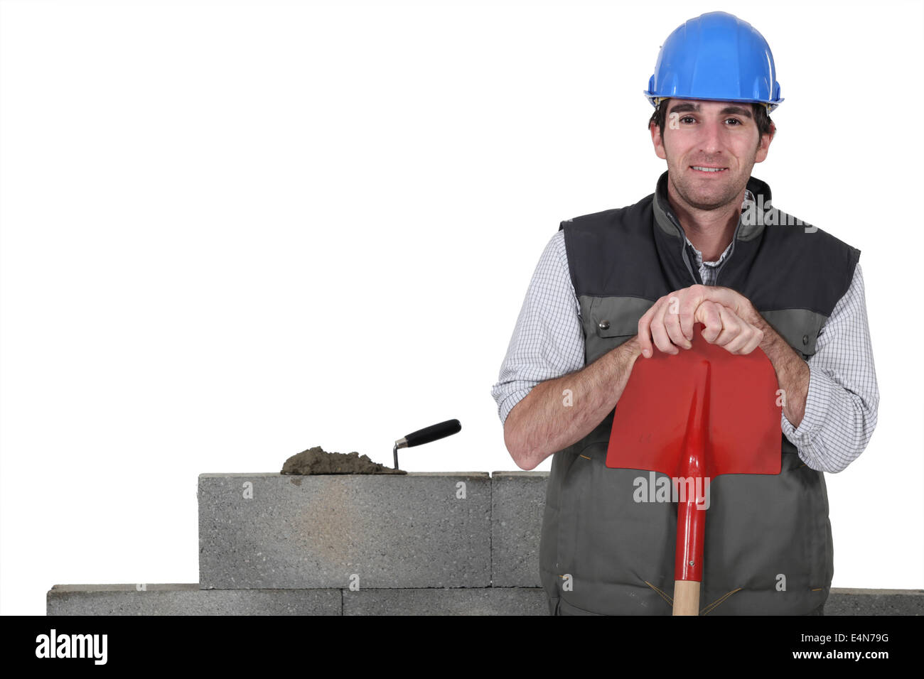 Stonemason standing proudly next to his work Stock Photo Alamy