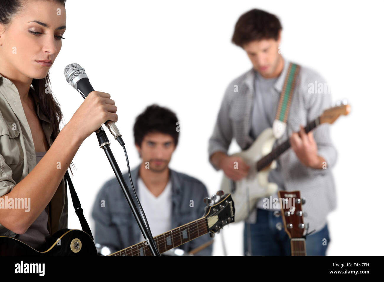 Young rock band with female vocalist Stock Photo