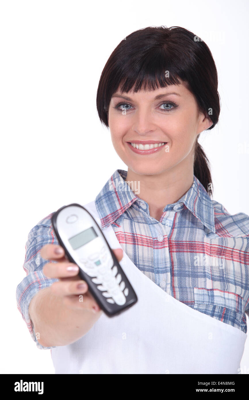 brunette with blue eyes and cordless phone Stock Photo