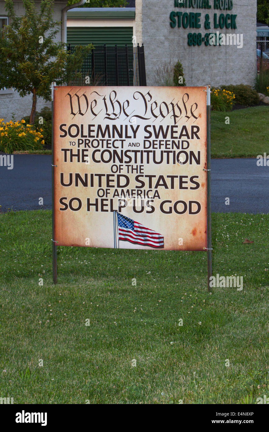 Sign with text modeled after the oath of office for the president of the United States, as a form of political protest. Stock Photo