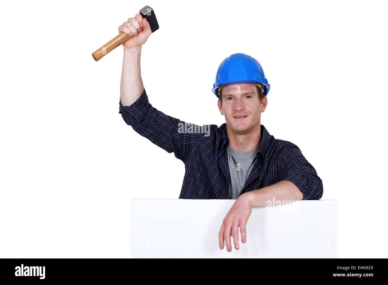 Man holding a mallet Stock Photo Alamy