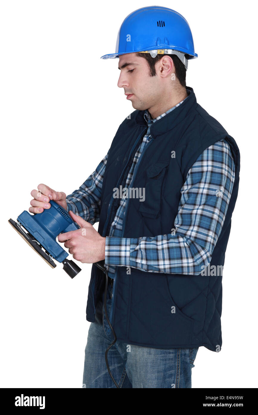 Man about to use electric sander Stock Photo Alamy