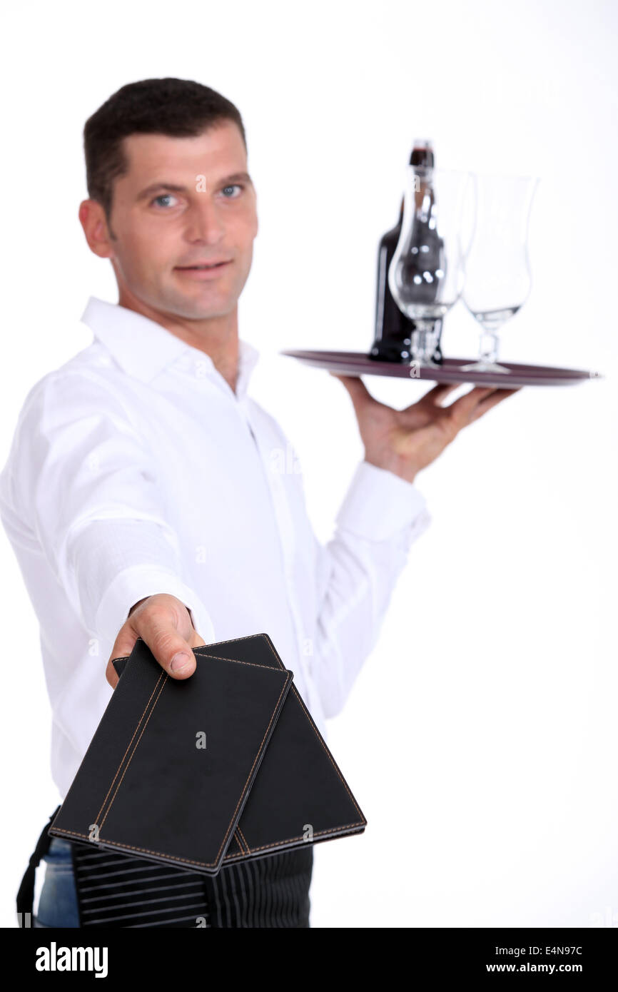 Waiter holding tray Stock Photo - Alamy
