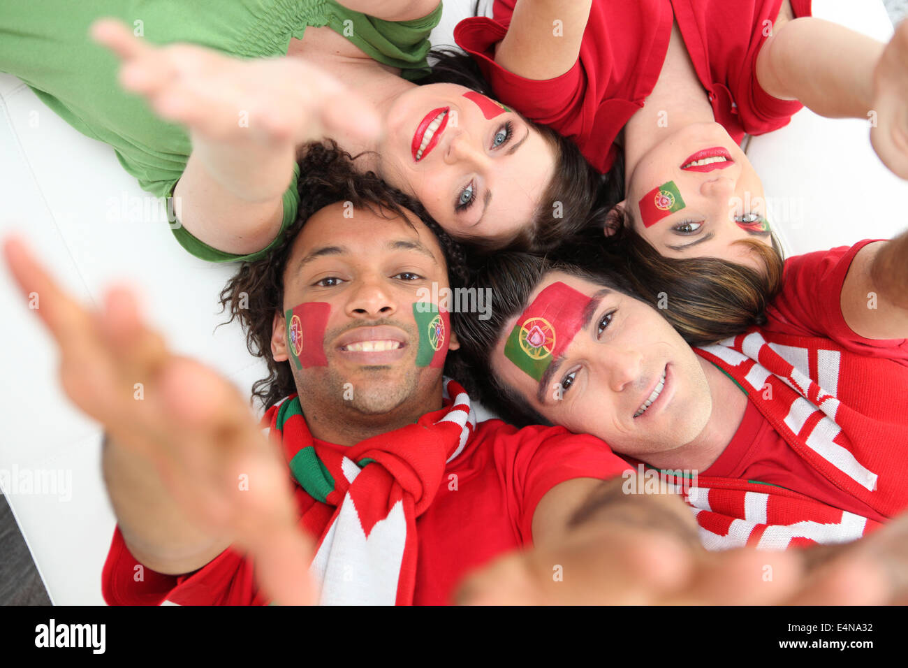 Portuguese football fans reaching out Stock Photo