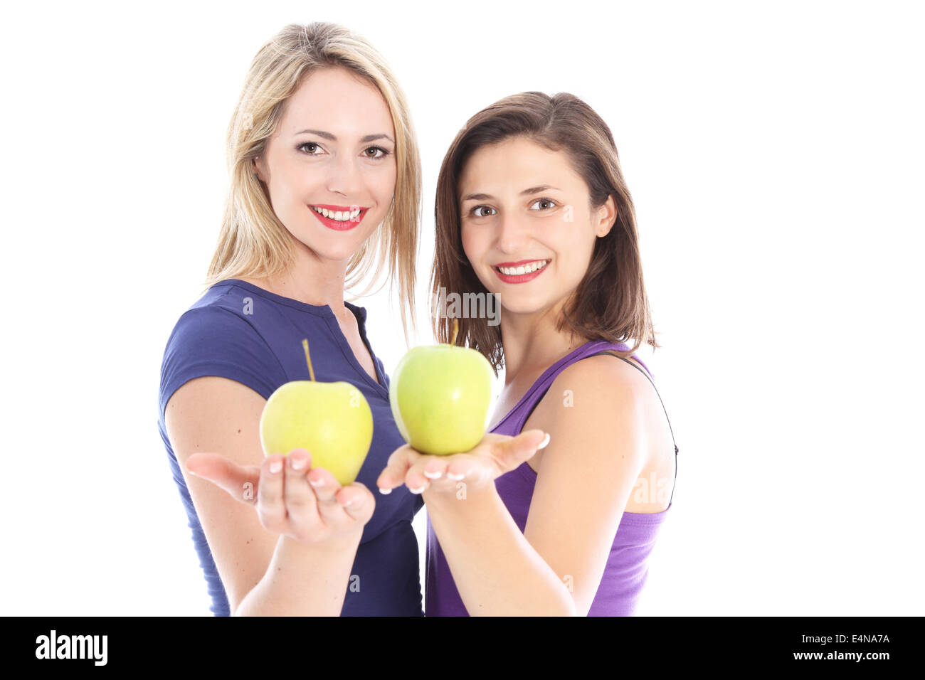 Two healthy women with apples Stock Photo