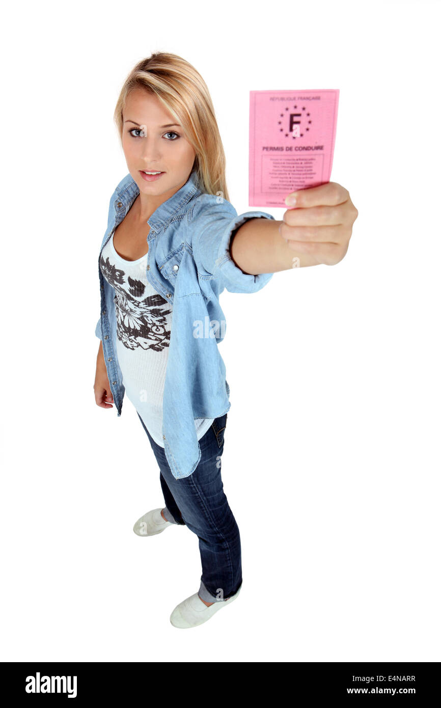 girl holding driving license Stock Photo