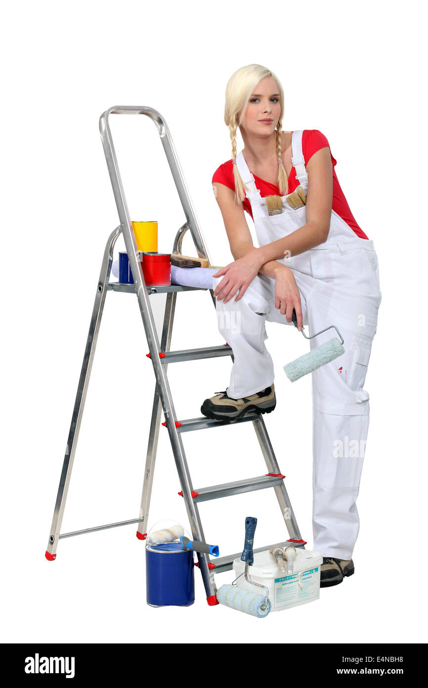 Cute woman painting and decorating Stock Photo