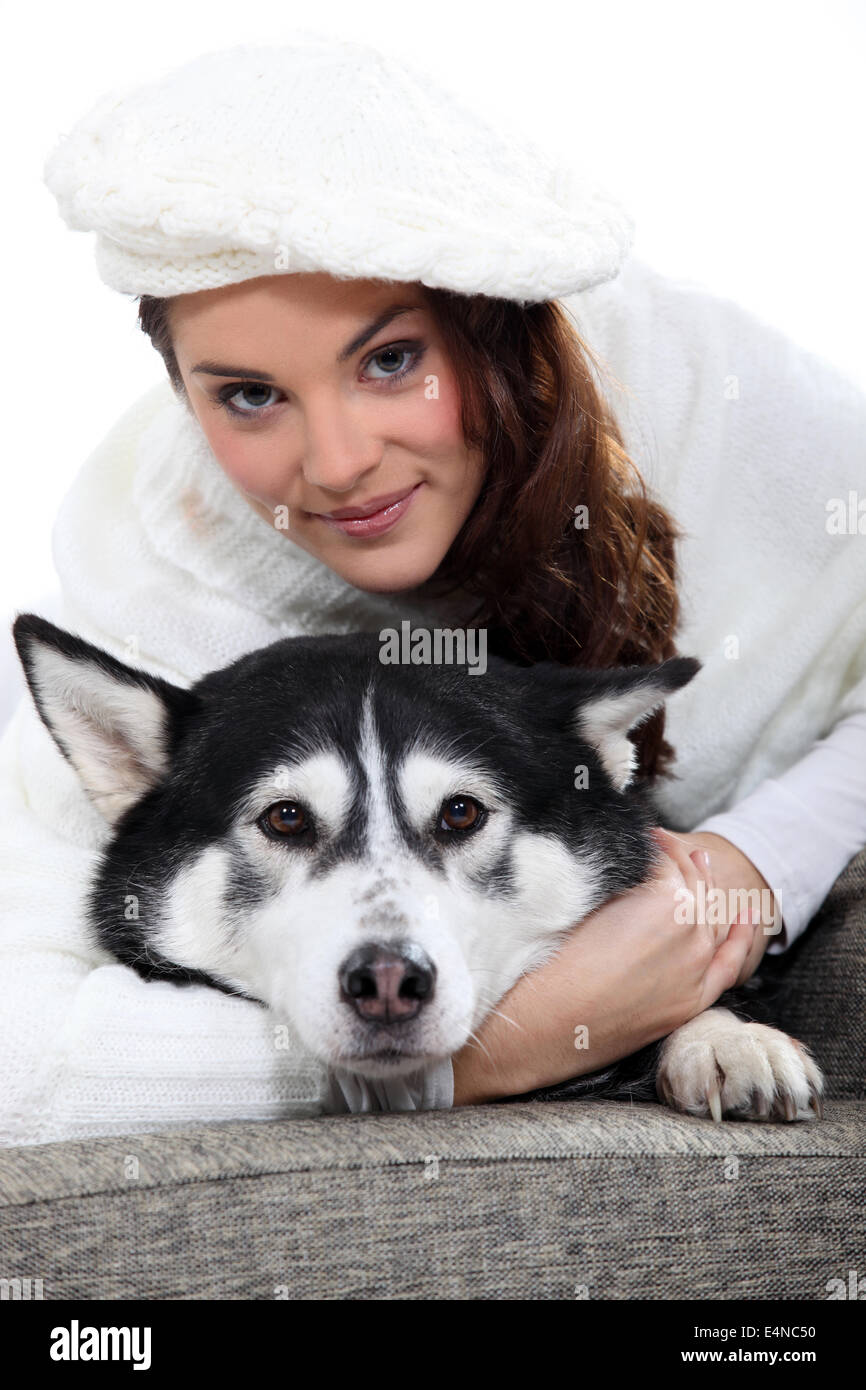 young woman cudling her dog Stock Photo