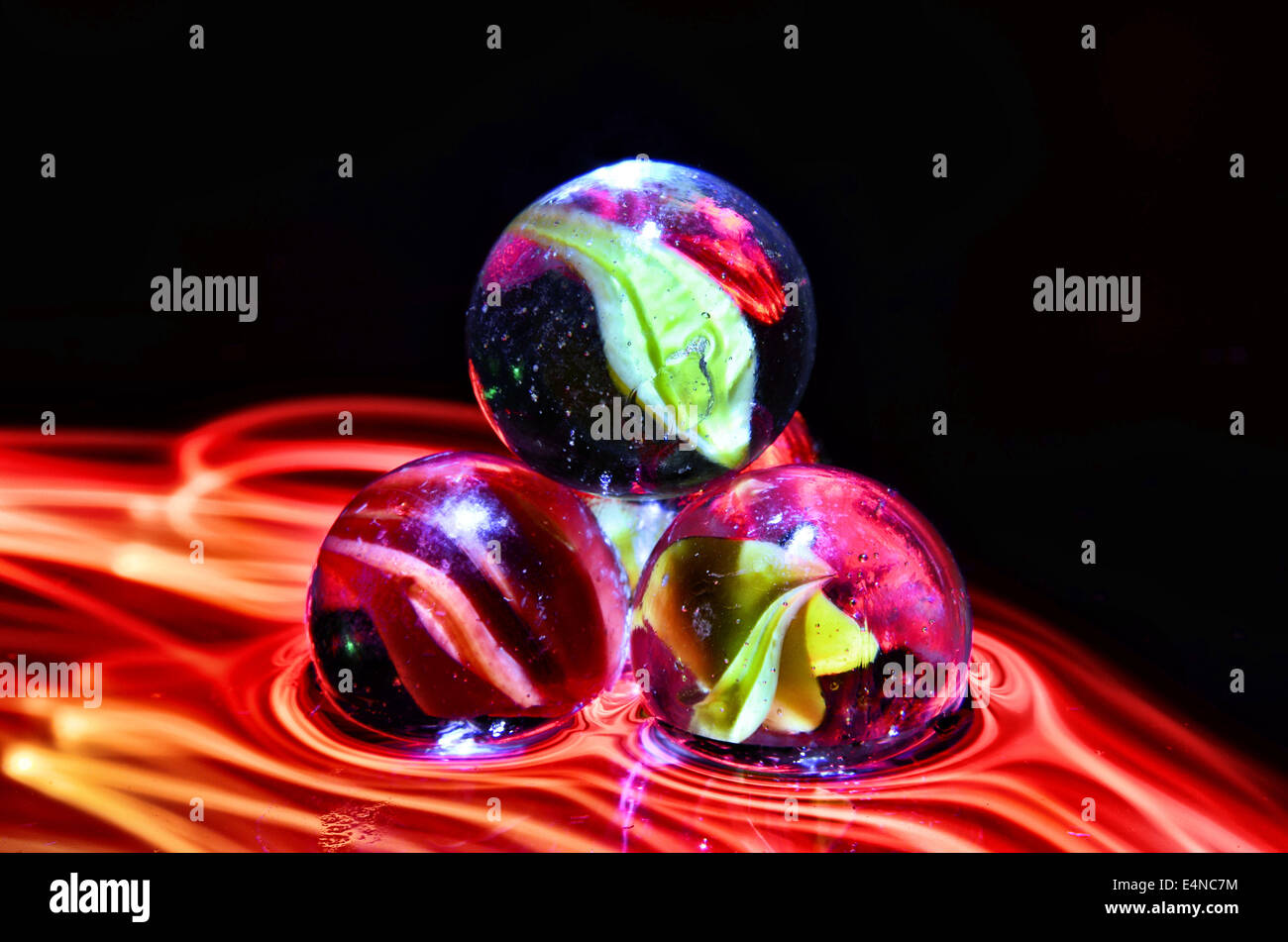 colored  marbles with different lighting effects Stock Photo