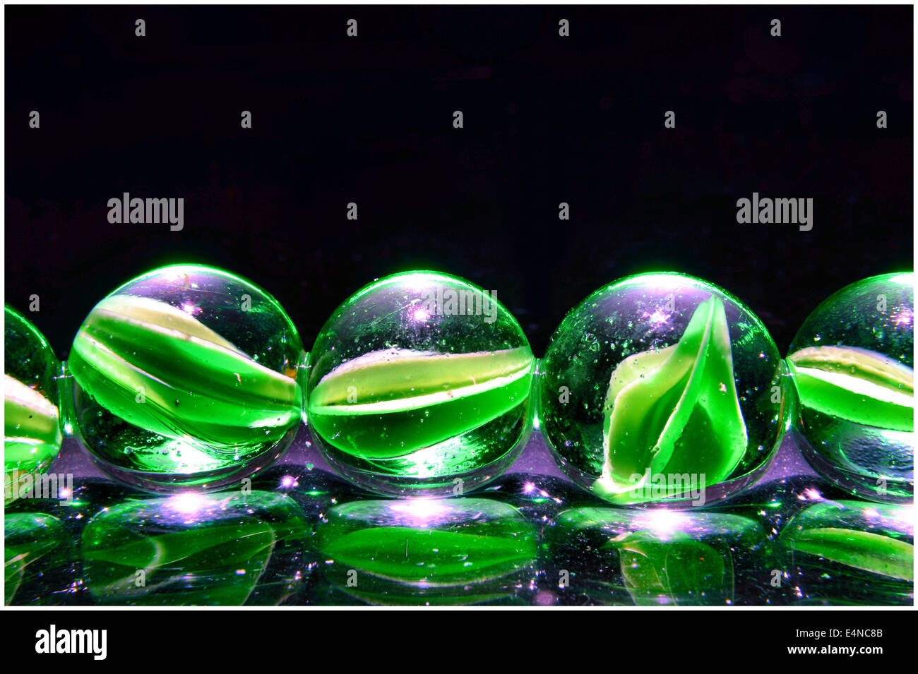 Handful of Red Marbles Stock Photo - Alamy