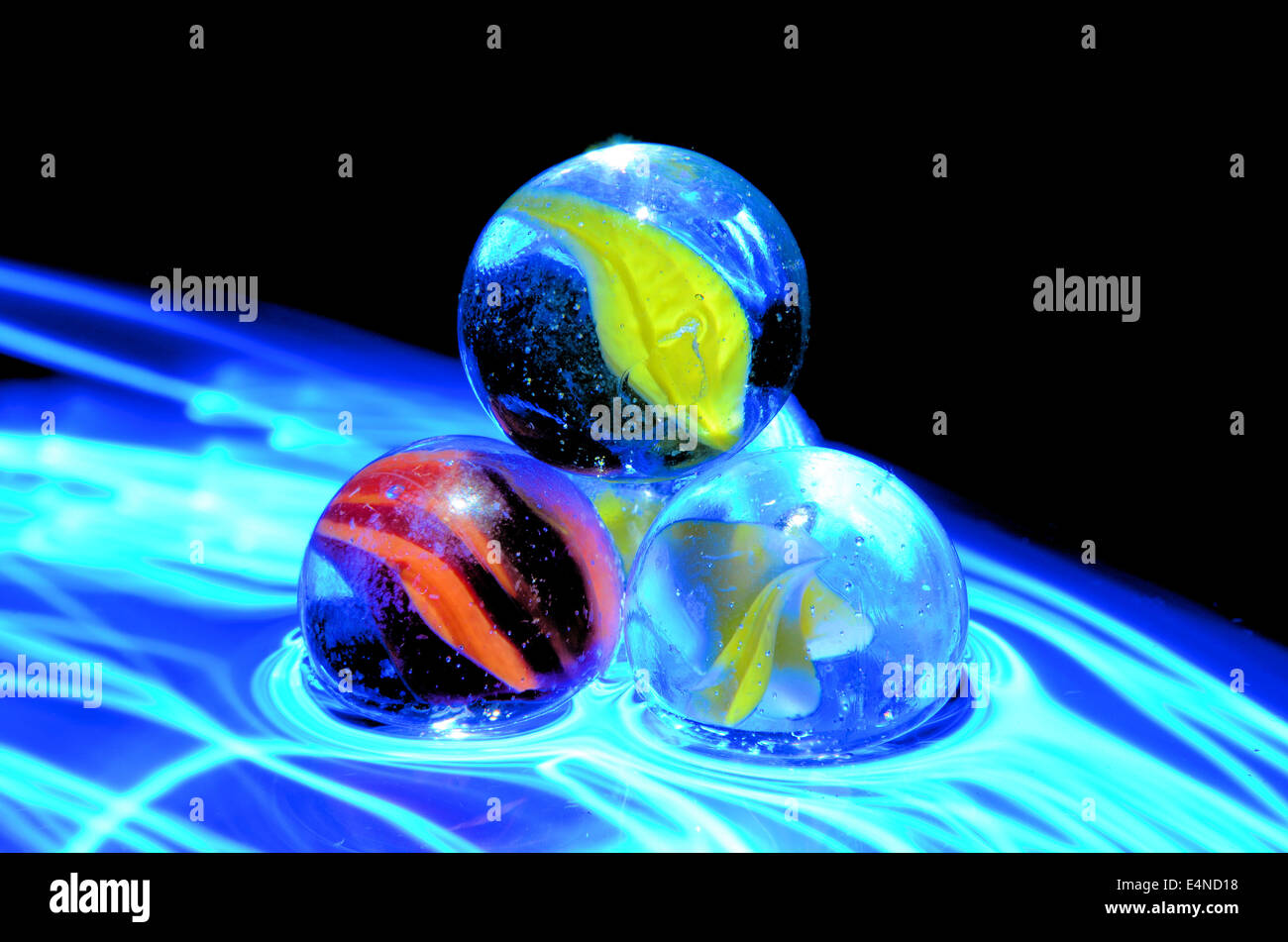 colored  marbles with different lighting effects Stock Photo