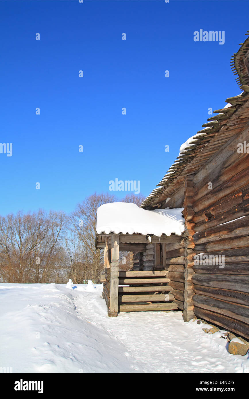 rural wooden house amongst snow Stock Photo - Alamy