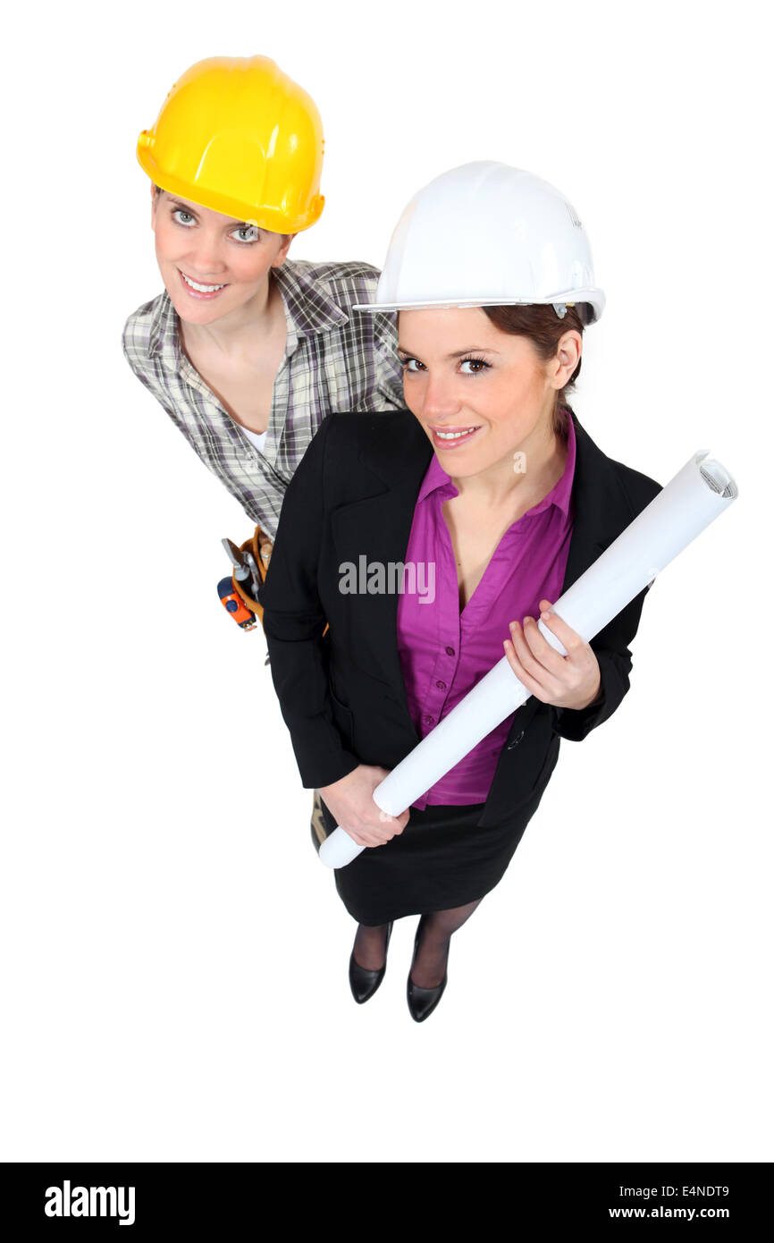 businesswoman and craftswoman posing together Stock Photo - Alamy