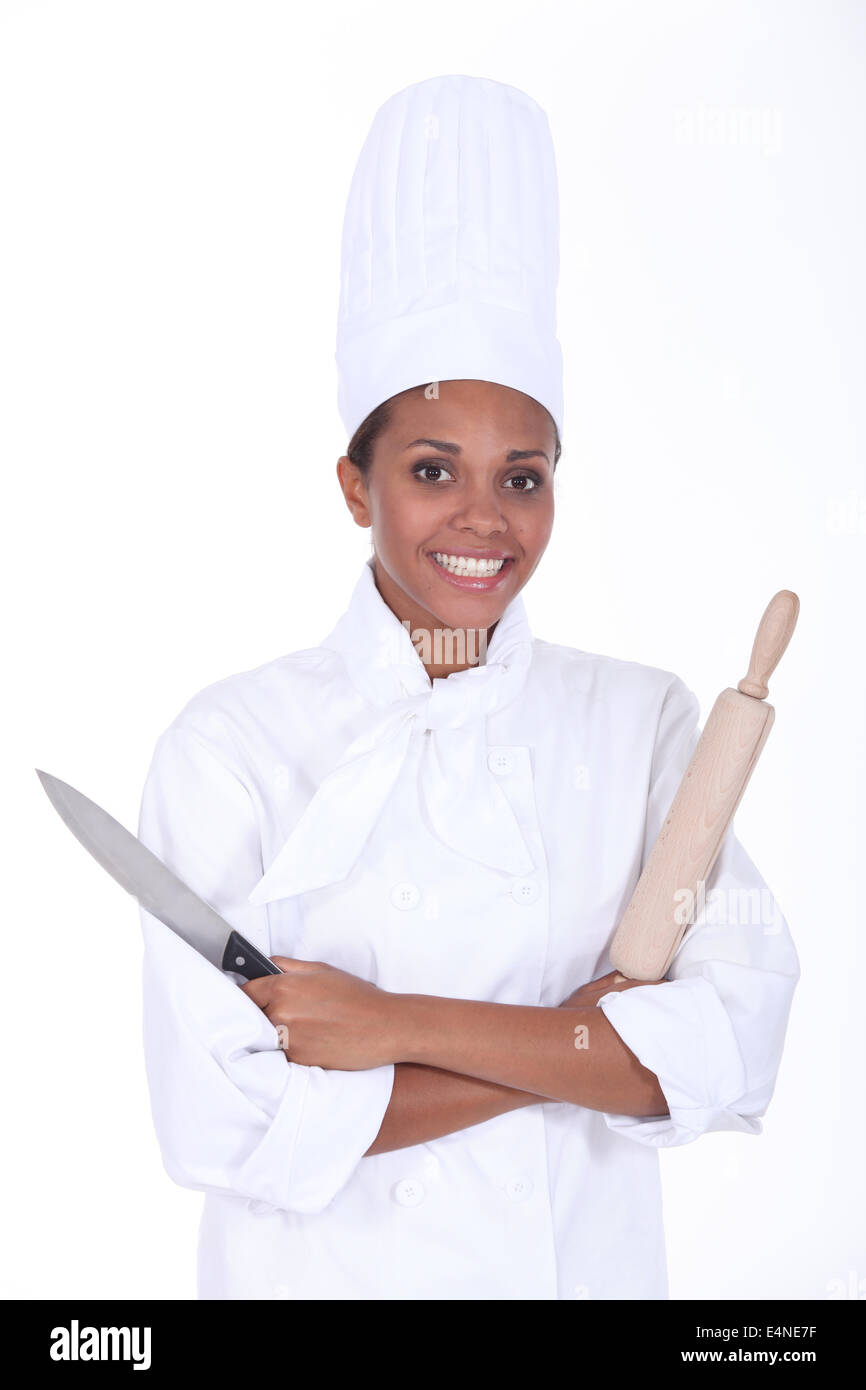 Chef with a rolling pin and knife Stock Photo Alamy