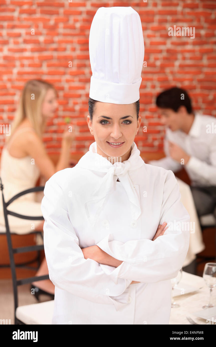 Female chef in full uniform Stock Photo Alamy