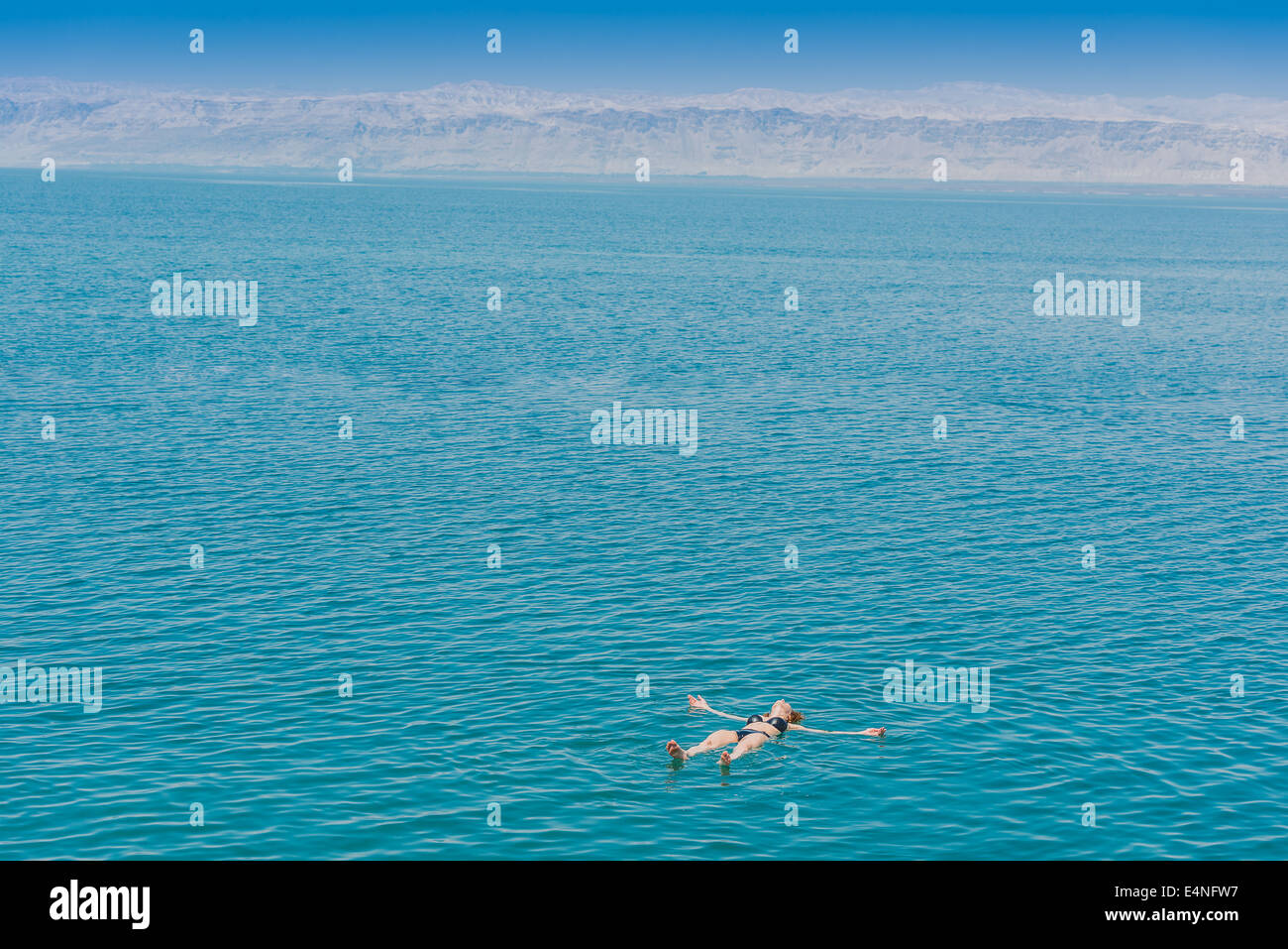 one woman swimming bathing in Dead Sea Jordan Stock Photo