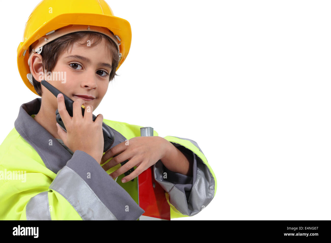 Young boy pretending to be a traffic guard Stock Photo