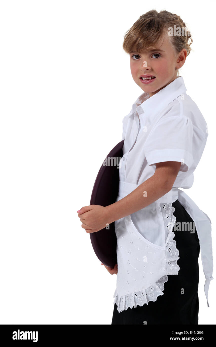 Girl dressed as a maid Stock Photo