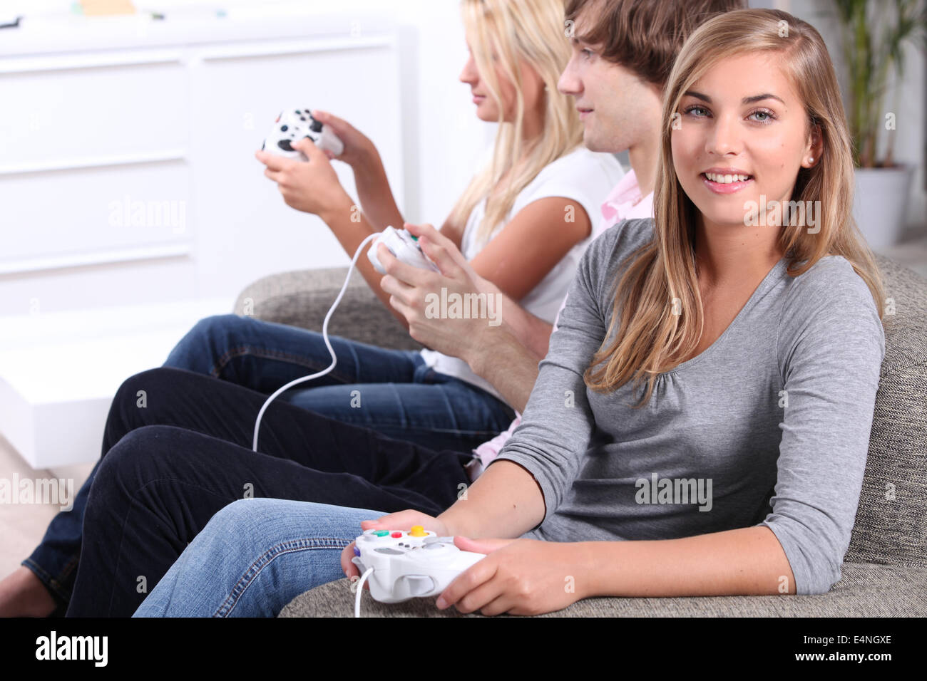 Teenagers playing computer games Stock Photo