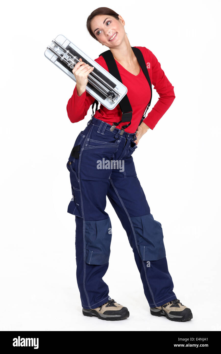 Woman with a tile cutter Stock Photo Alamy
