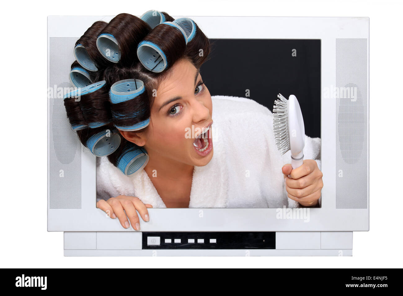 Woman in rollers inside a television Stock Photo