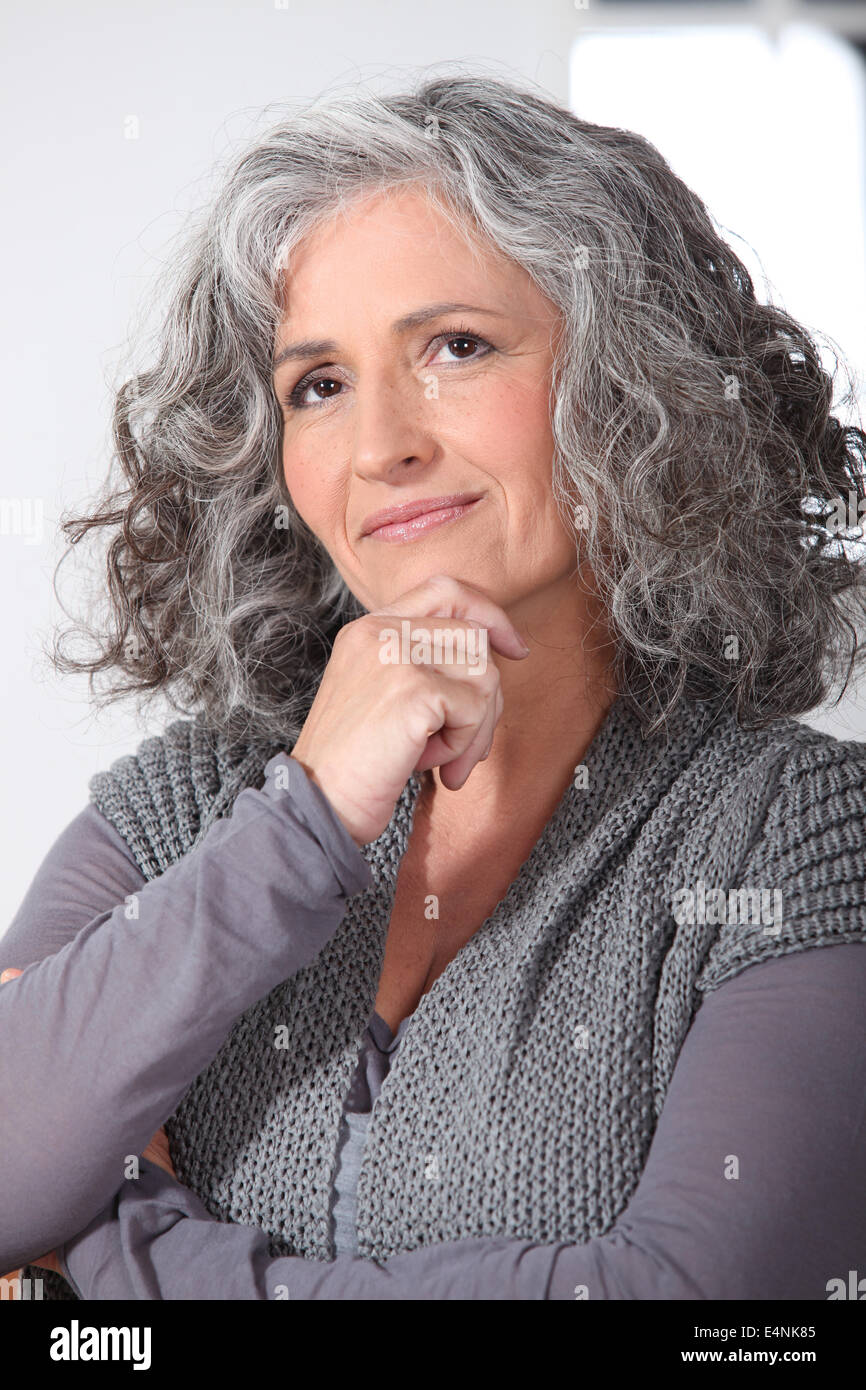 Pensive middleaged woman Stock Photo Alamy
