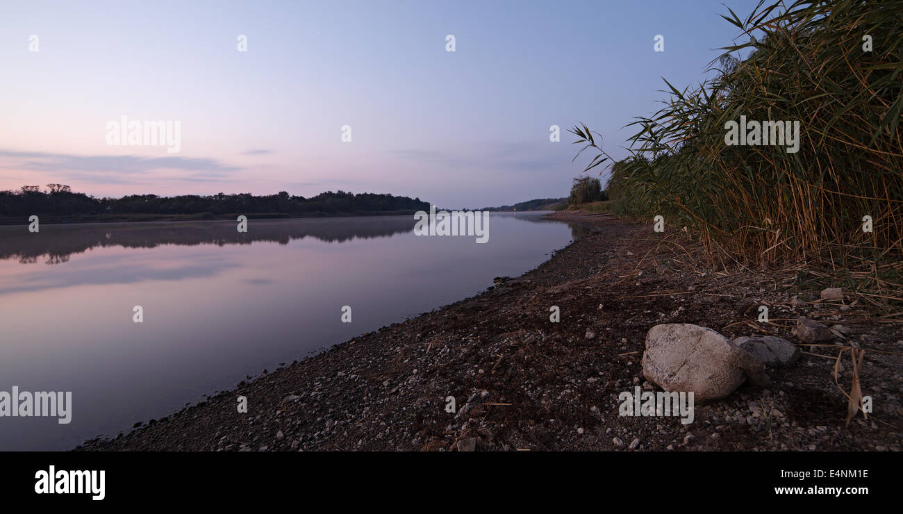 Panoramic view of misty morning lake Stock Photo