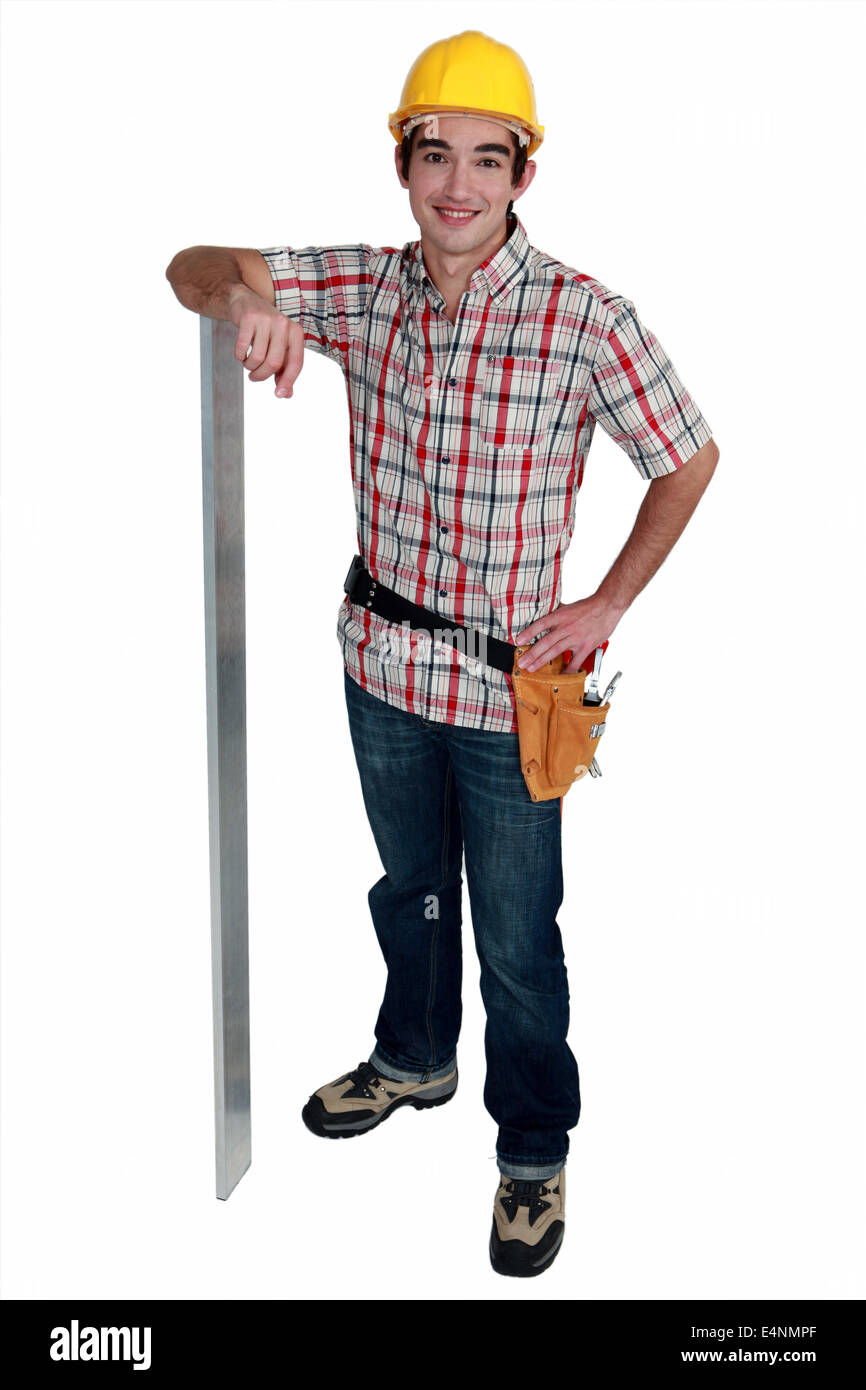 construction worker with metal pole Stock Photo