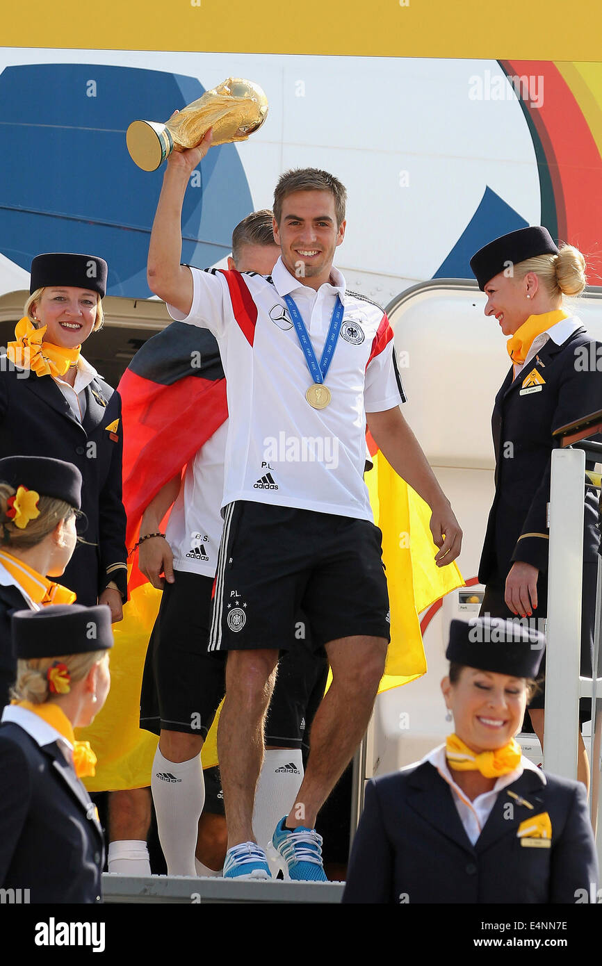 Berlin, Germany. 15th July 2014. Philipp Lahm comes out of the aircraft with the cup  on July 15, 2014 in Berlin, Germany.   Credit:  norbert schmidt/Alamy Live News Stock Photo