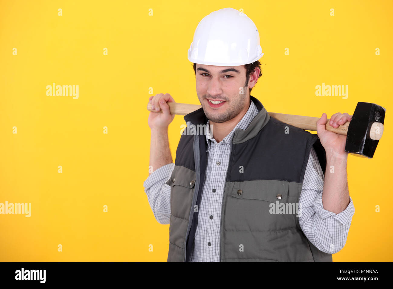 Tradesman carrying a mallet Stock Photo