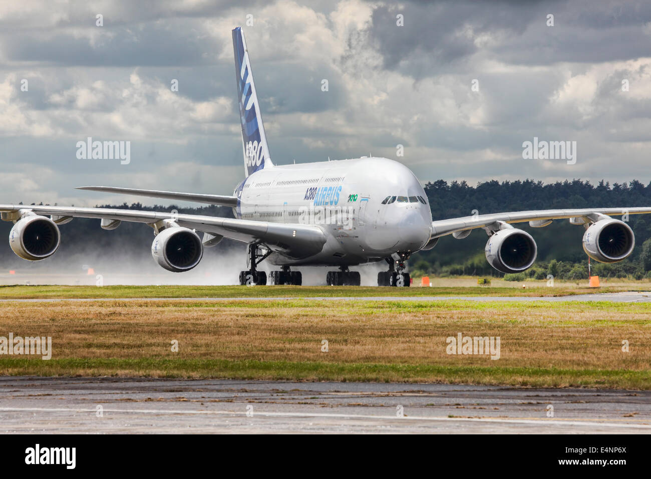 Airbus 380 rolling on a wet runway Stock Photo