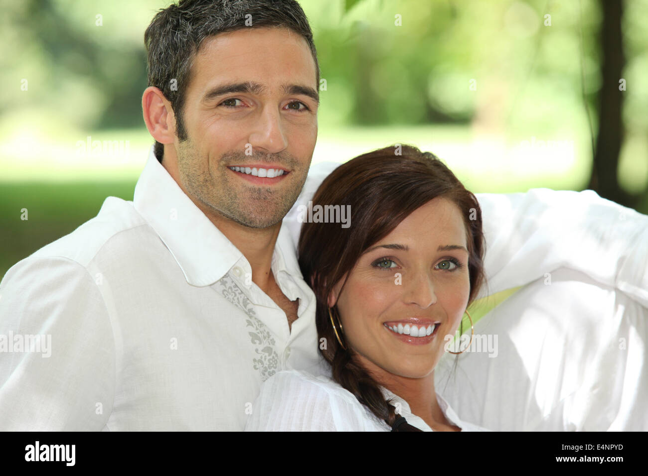 Smiling couple outdoors Stock Photo - Alamy