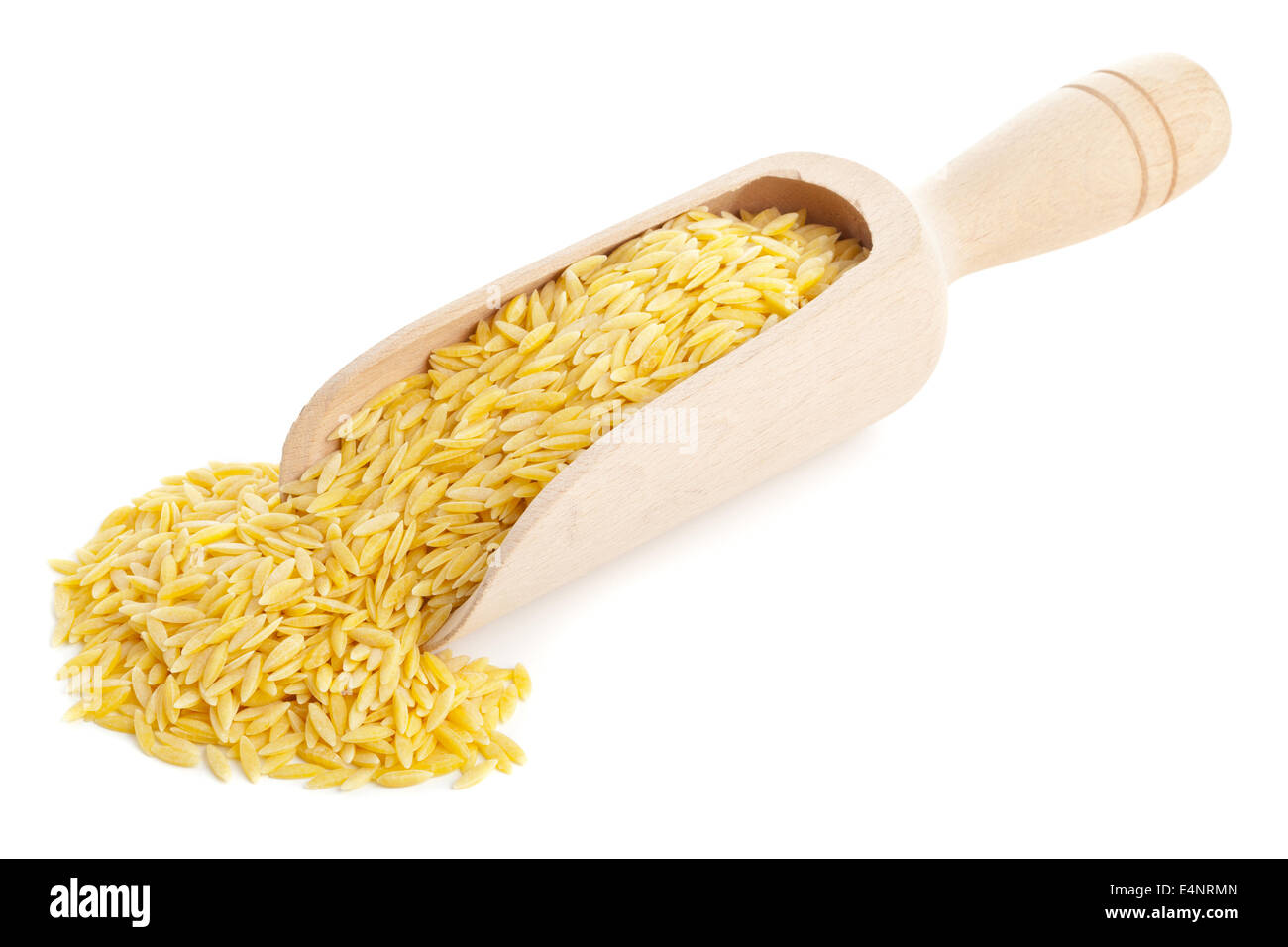 Durum wheat, also hard wheat or macaroni wheat, on wooden scoop over white background Stock Photo