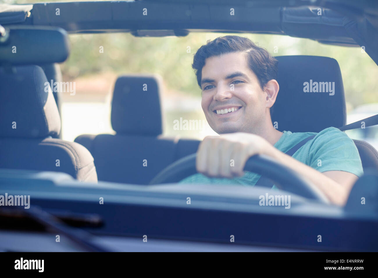 View of man driving car Stock Photo