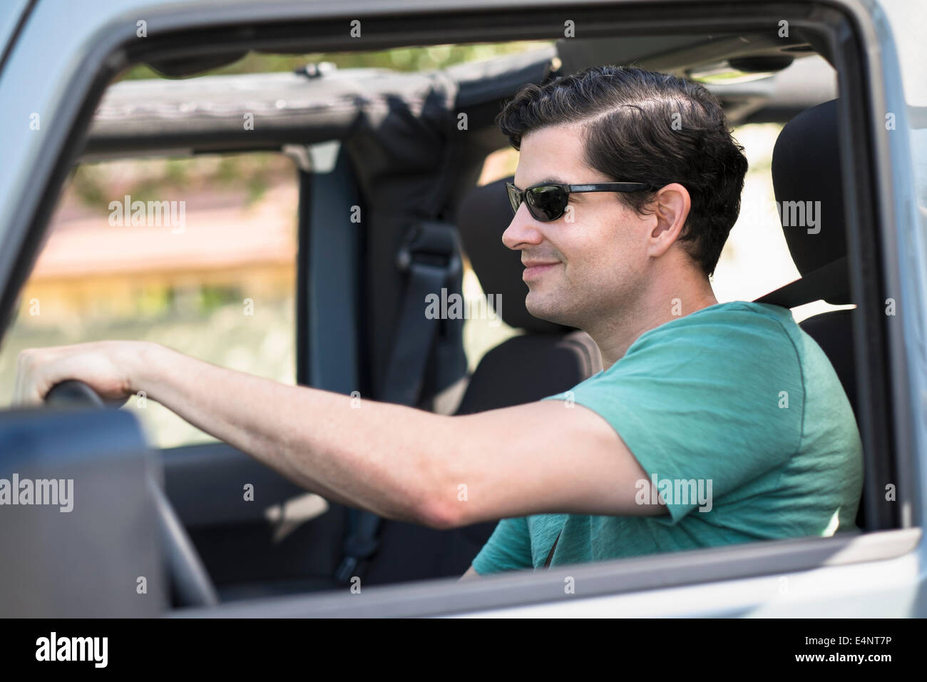 View of man driving car Stock Photo