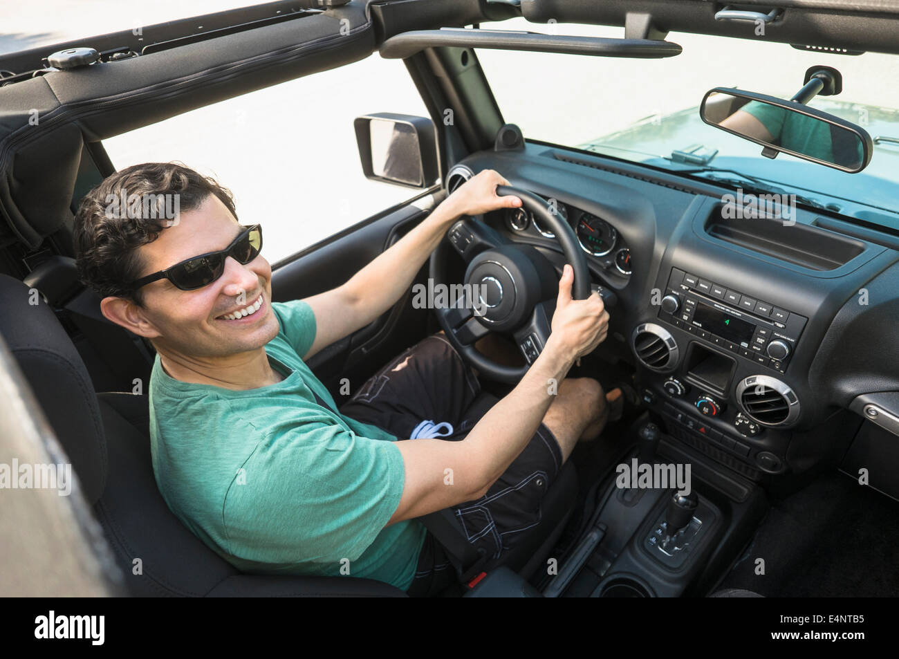 Elevated view of man driving car Stock Photo
