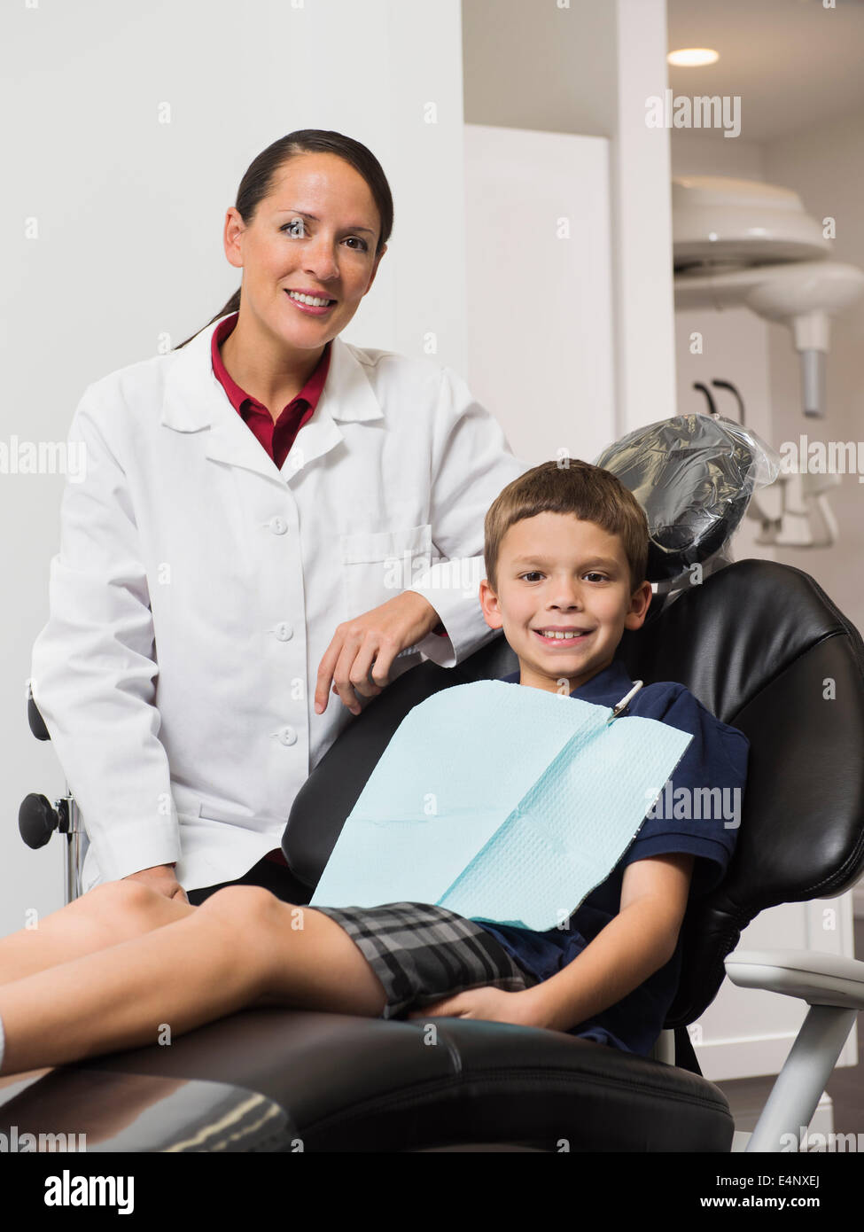 Portrait of dentist with patient (12-13) Stock Photo