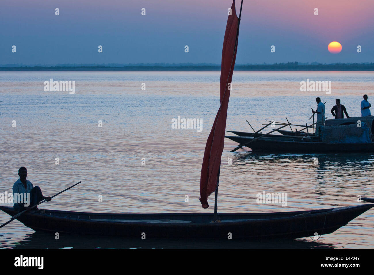 sunset in the river Stock Photo - Alamy