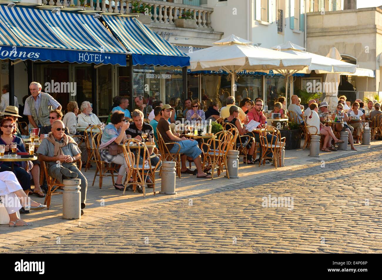 Pavement cafes / restaurants at Saint Martin de Re on Ile de Re. Poitou-Charentes region of France. Stock Photo