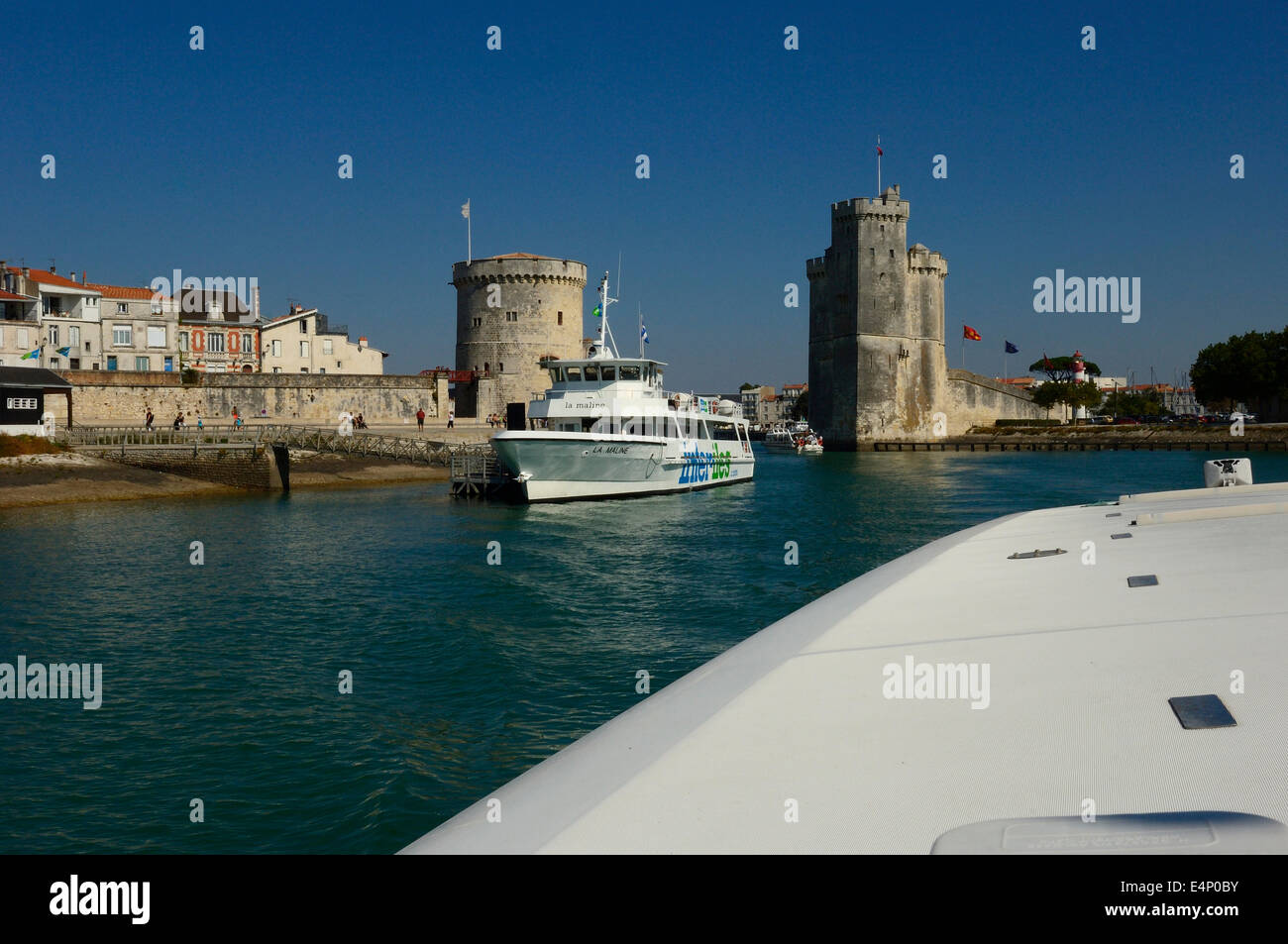 La Chaine, Chain Tower and St. Nicholas towers at the entrance to the ancient port of La Rochelle  Charente-Maritime, France, Europe Stock Photo