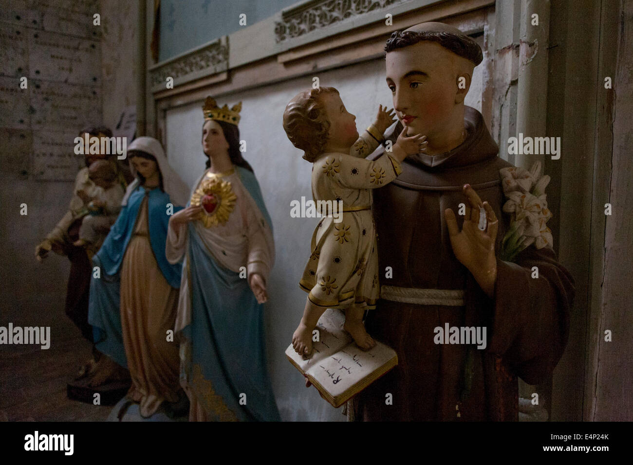 Plaster Catholic idols in a corner of the church at Le GrandPressigny