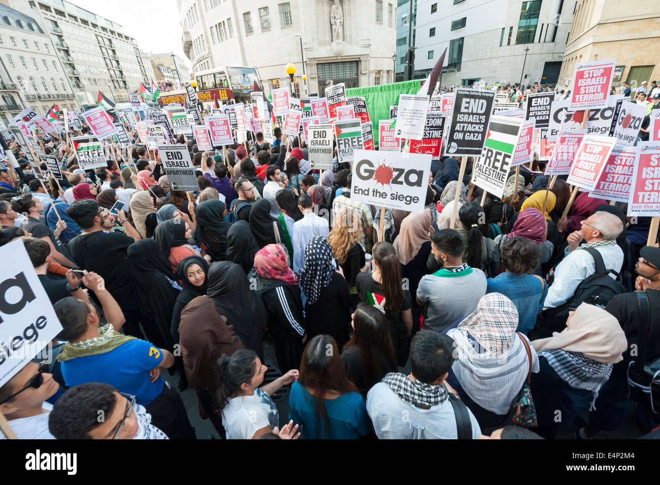 Portland Place, London, UK. 15th July 2014. Thousands of protesters demonstrate outside the BBC in London in response to the corporation's perceived bias against Palestinian reporting in the current Gaza crisis. Credit:  Lee Thomas/Alamy Live News Stock Photo