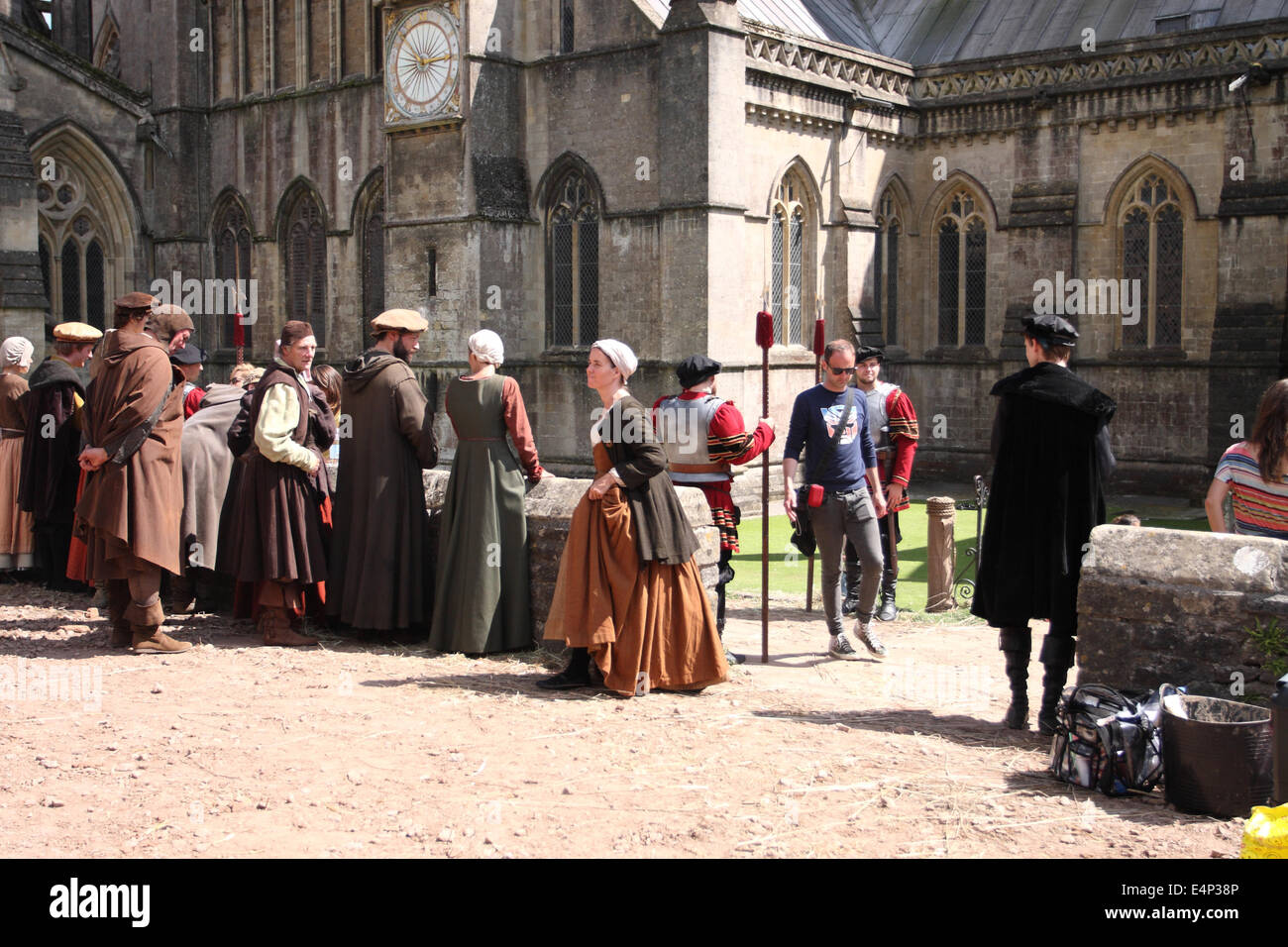 Wells, Somerset, UK. 15th July, 2014. The BBC are filming a new drama called 'Wolf Hall' based on the book by Hilary Mantel. The six part series focuses on the politics of despotism between King Henry VIII and Thomas Cromwell. Filming took place at Wells Cathedral today and the series will be screened in early 2015. Stock Photo